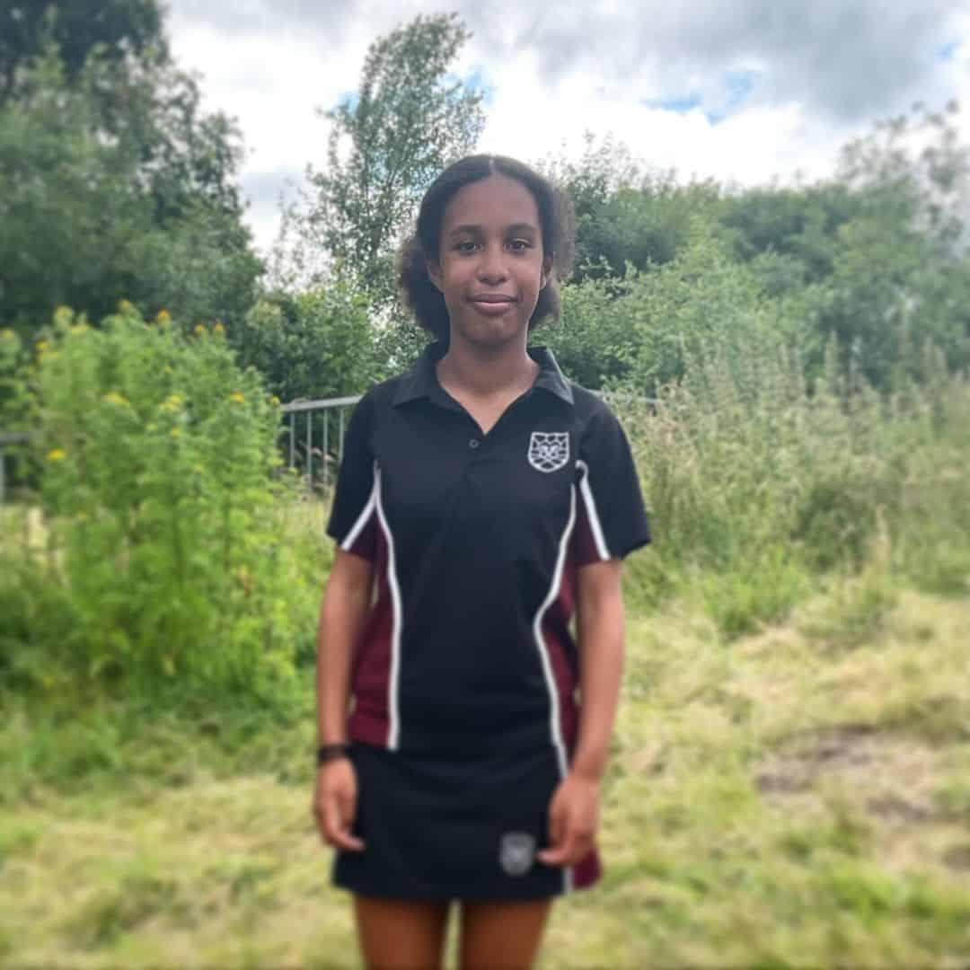 Hazel Grove High School student smiles after breaking the Year 7 200m record.